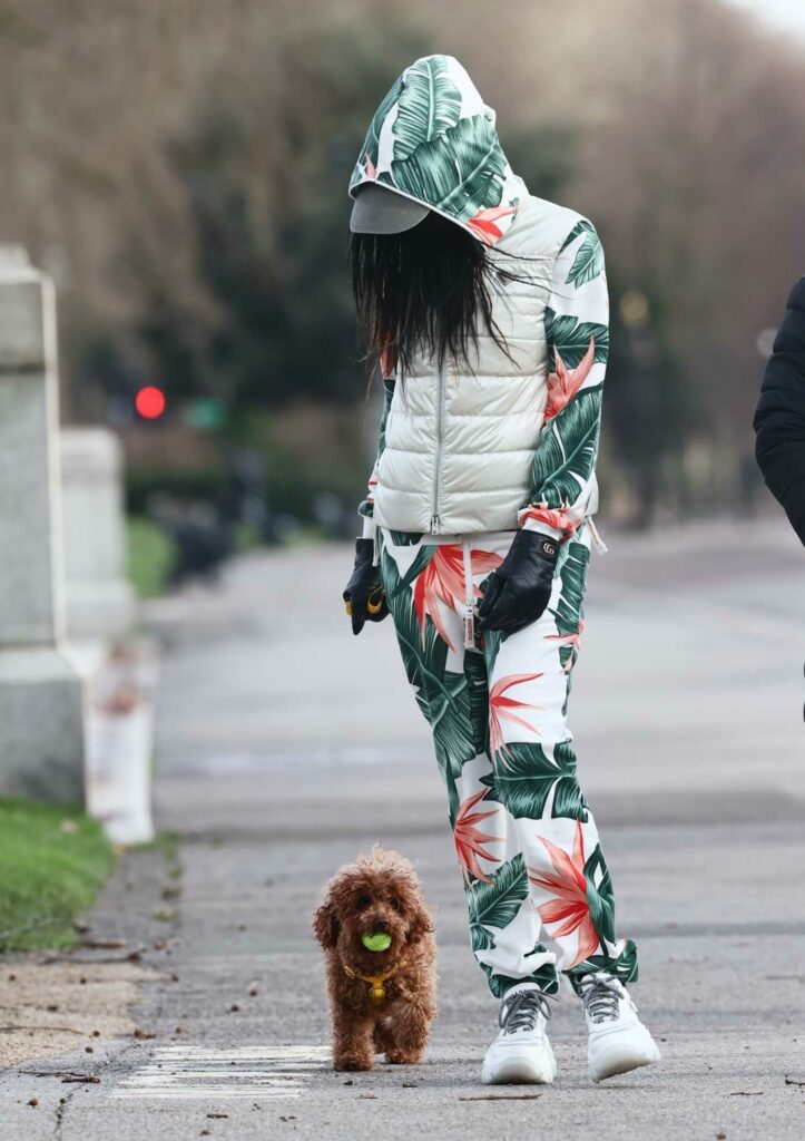 Sinitta in a Floral Jumpsuit