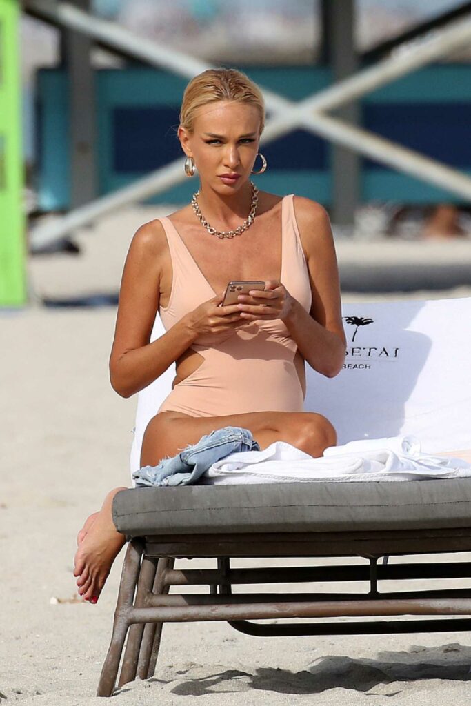 Victoria Lopyreva in a Beige Swimsuit