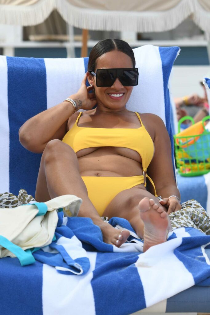 Evelyn Lozada in a Yellow Bikini