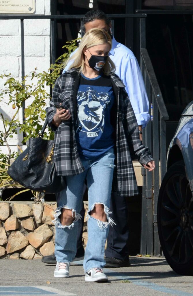 Holly Madison in a Blue Ripped Jeans