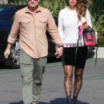 Kelly Dodd in a Fendi Outfit Leaves Lunch with Husband Rick Leventhal in Newport Beach