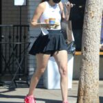 Meagan Camper in a Black Mini Skirt Picks Up Coffee at Alfred in Los Angeles