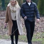 Molly Smith in a Beige Knit Turtleneck Walks Her Dogs Out with Callum Jones in Manchester