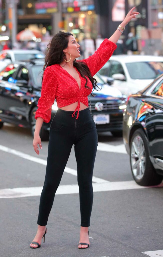 Estrella Nouri in a Red Blouse