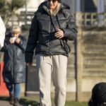 Gemma Atkinson in a Black Beanie Hat Walks Her Dog in Manchester