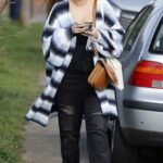 Jacqueline Jossa in a Striped Cardigan Was Seen Out in Essex