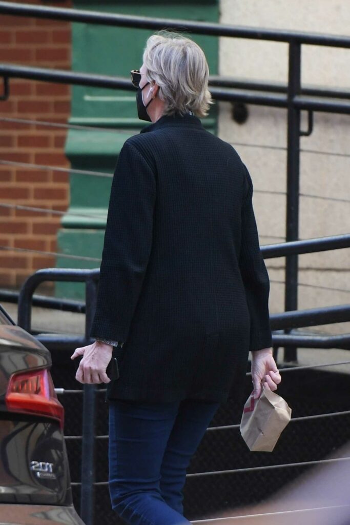 Jane Lynch in a Black Protective Mask