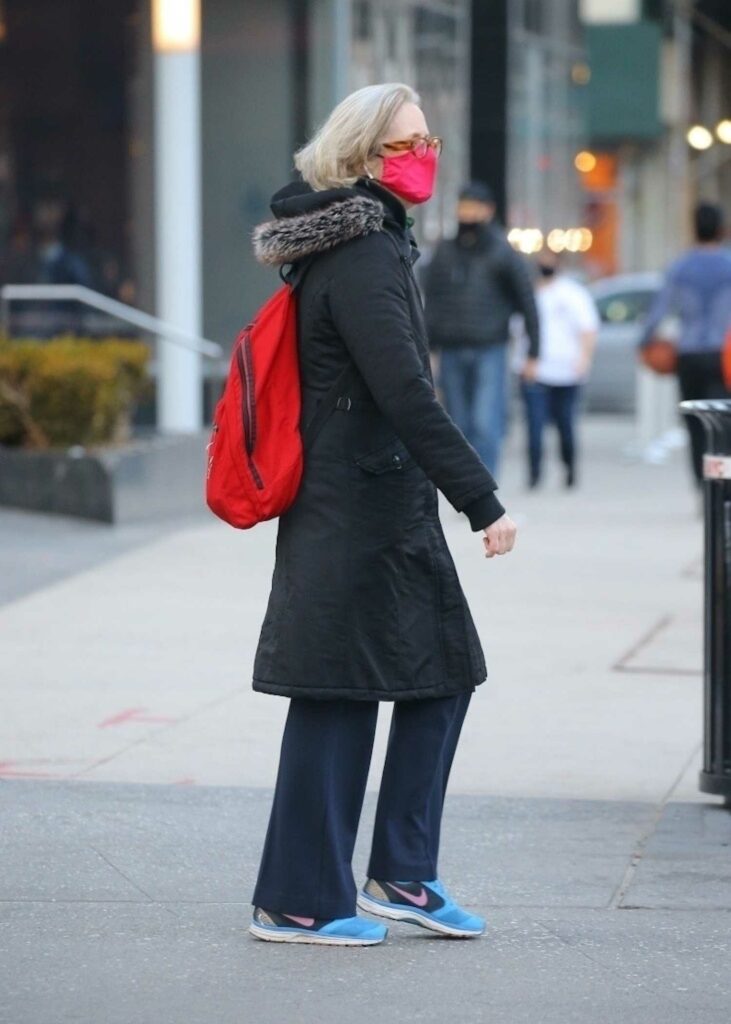 Jessica Lange in a Red Protective Mask