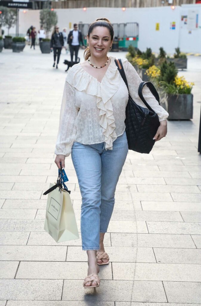 Kelly Brook in a White Blouse