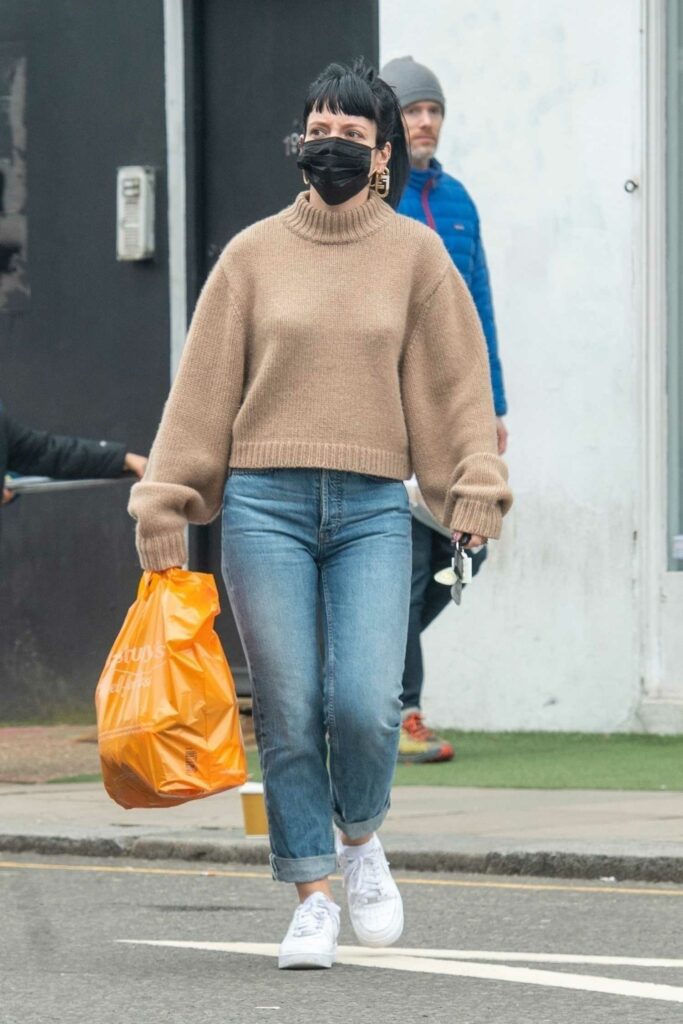 Lily Allen in a Tan Sweater
