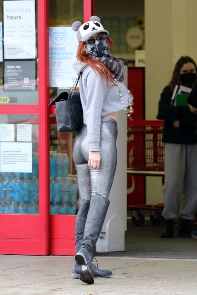 Phoebe Price in a Silver Leggings