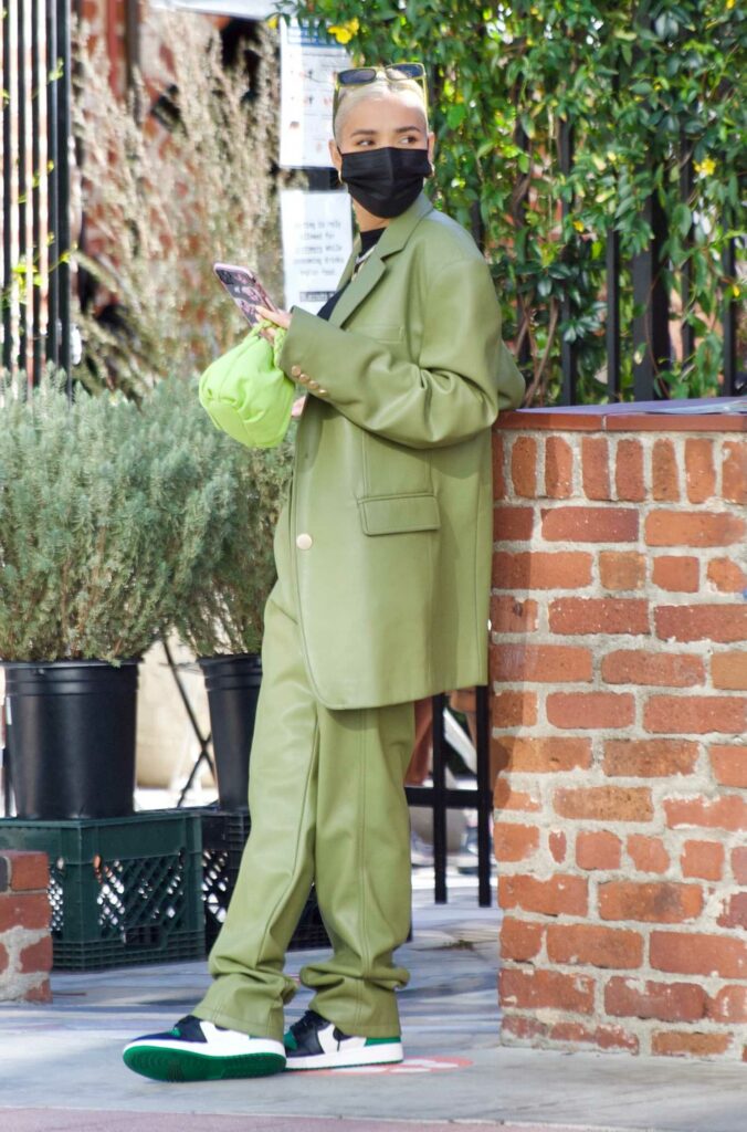 Pia Mia in a Green Suit