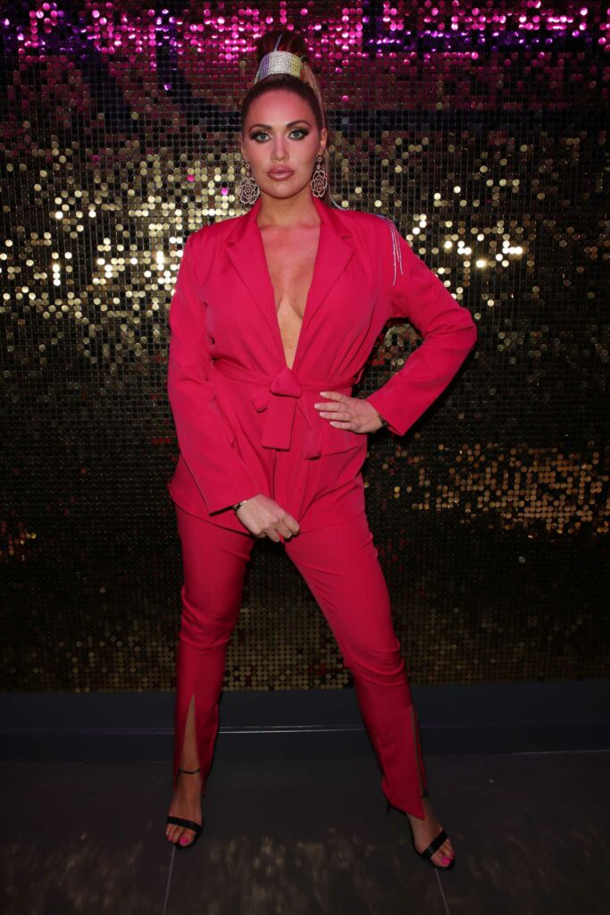 Amy Childs in a Red Suit