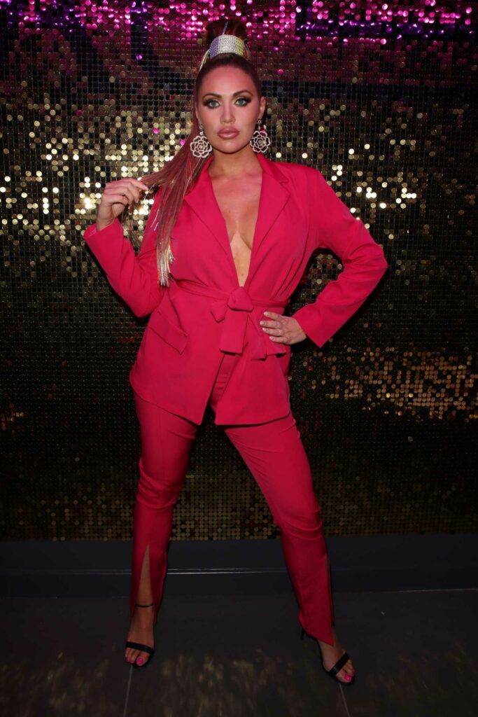 Amy Childs in a Red Suit