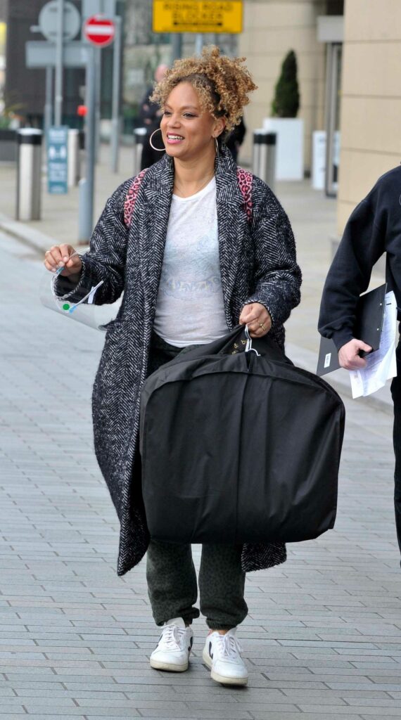 Angela Griffin in a Grey Coat