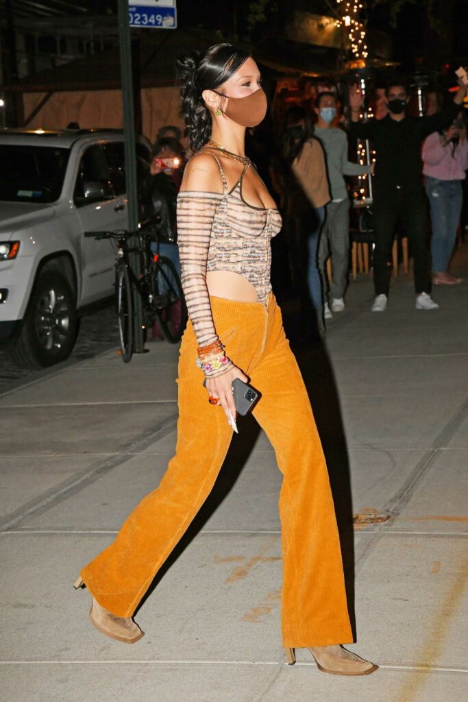 Bella Hadid in an Orange Pants