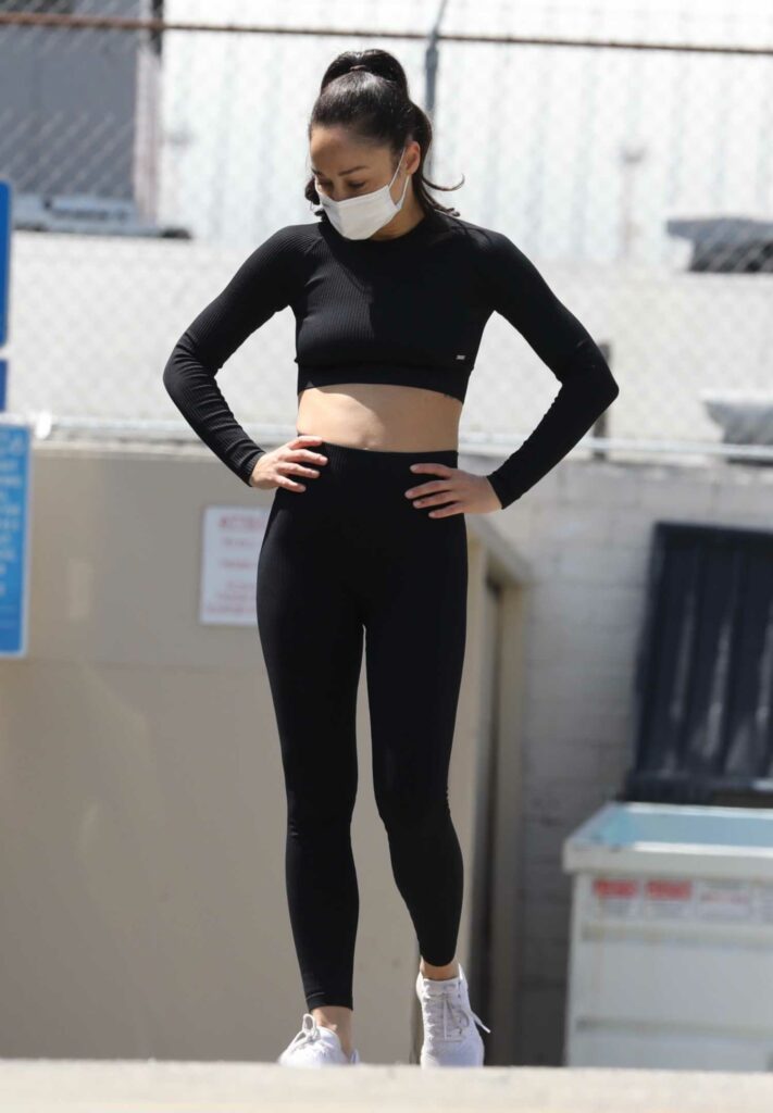 Cara Santana in a Black Workout Ensemble