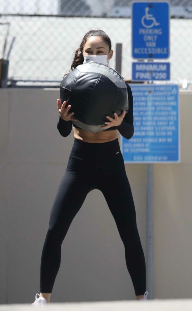 Cara Santana in a Black Workout Ensemble