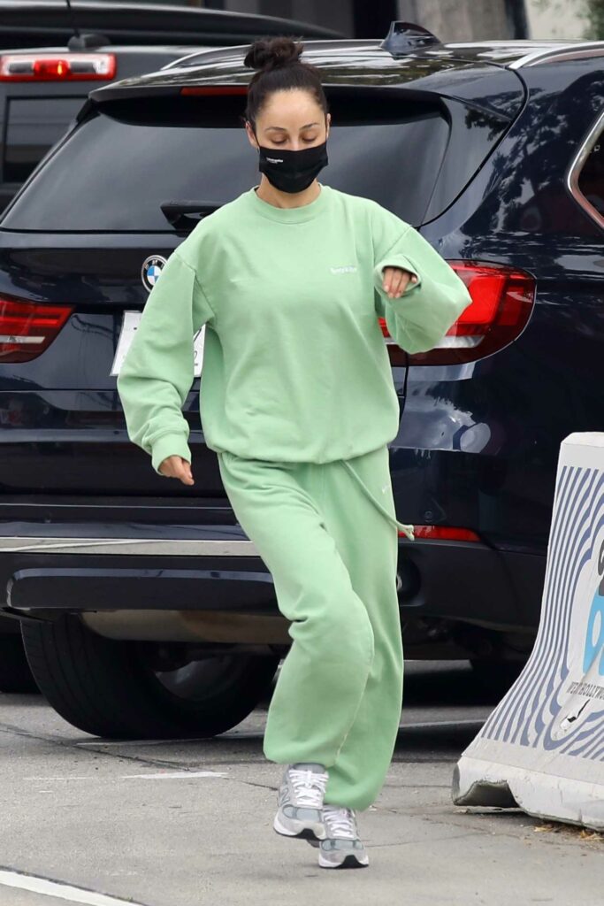 Cara Santana in a Green Sweatsuit