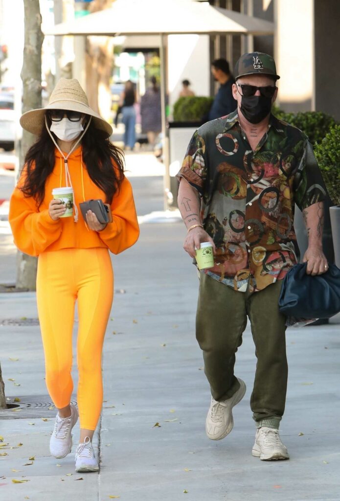 Cara Santana in an Orange Outfit