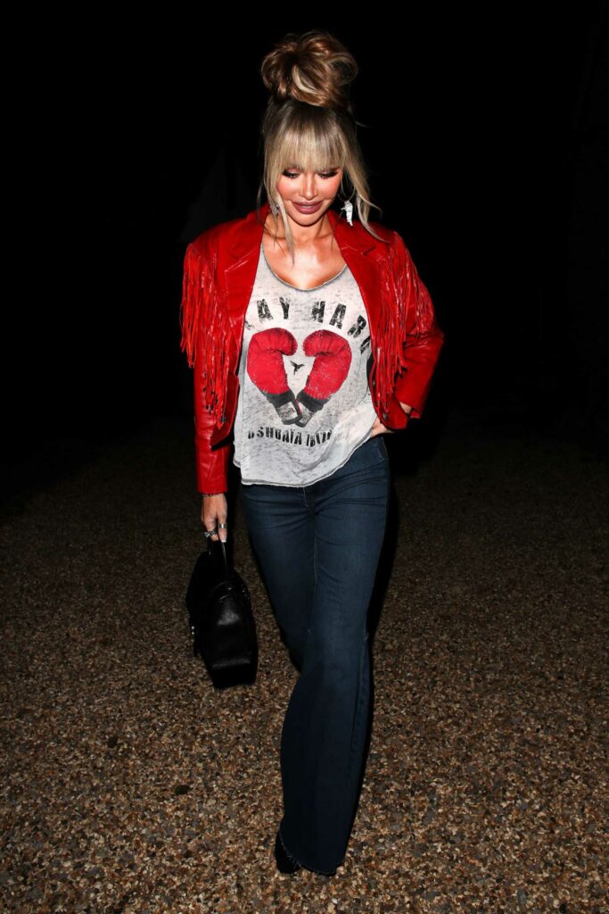 Chloe Sims in a Red Leather Jacket