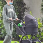 Elsa Hosk in an Olive Sweatsuit Walks with Her Baby in Pasadena