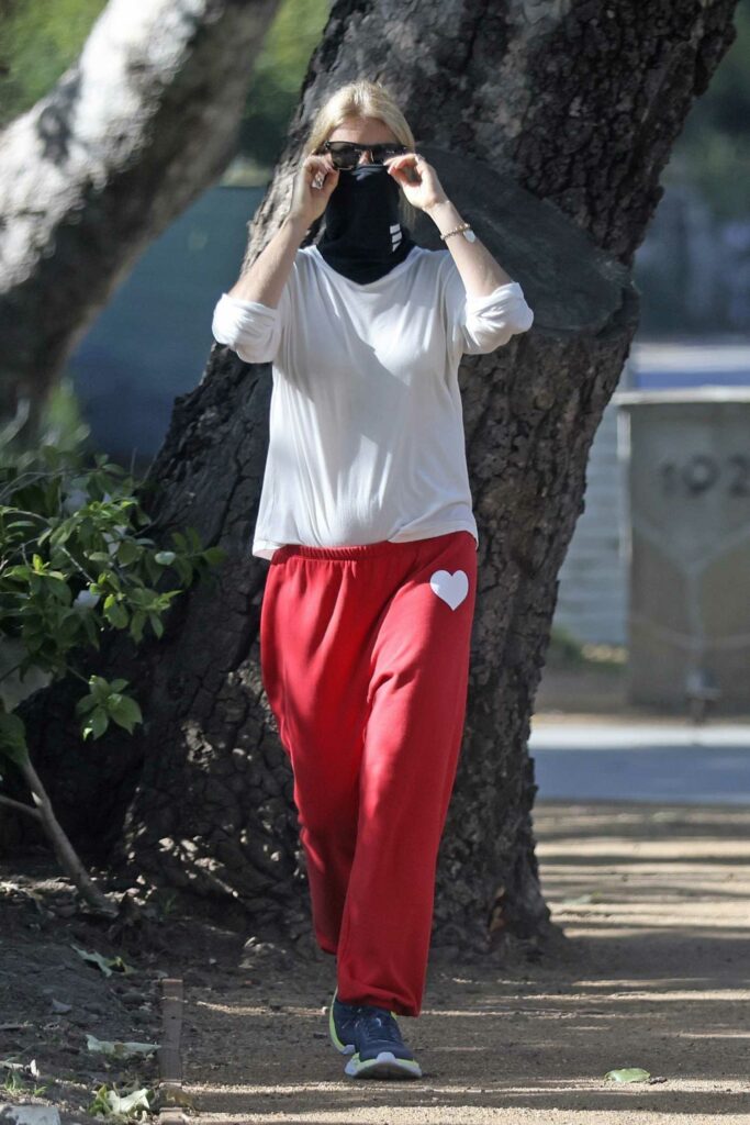 Gwyneth Paltrow in a Red Sweatpants