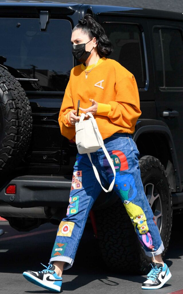 Jessie J in an Orange Sweatshirt