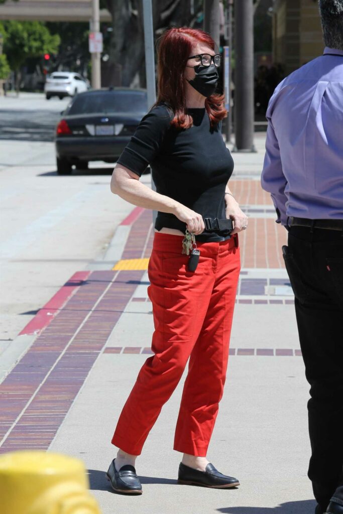 Kate Flannery in a Red Pants