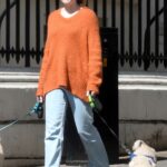 Nicola Roberts in an Orange Sweater Walks Her Dogs in London