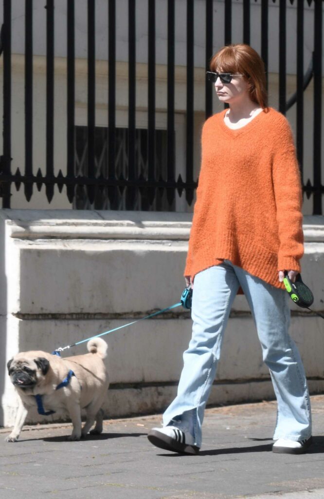Nicola Roberts in an Orange Sweater