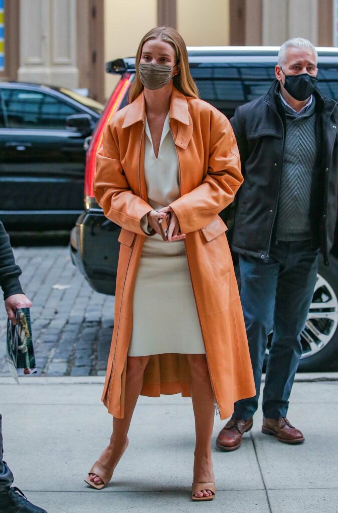 Rosie Huntington-Whiteley in a Coral-Hued Trench Coat