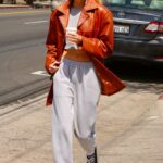 Stella Maxwell in an Orange Jacket Gets Coffee at Blue Bottle Coffee in Los Feliz