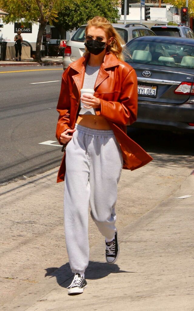 Stella Maxwell in an Orange Jacket