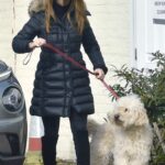Summer Monteys-Fullam in a Black Puffer Coat Takes Her Dog to the Vets in London