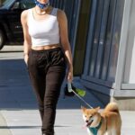 Wallis Day in a White Top Walks Her Dog in Vancouver