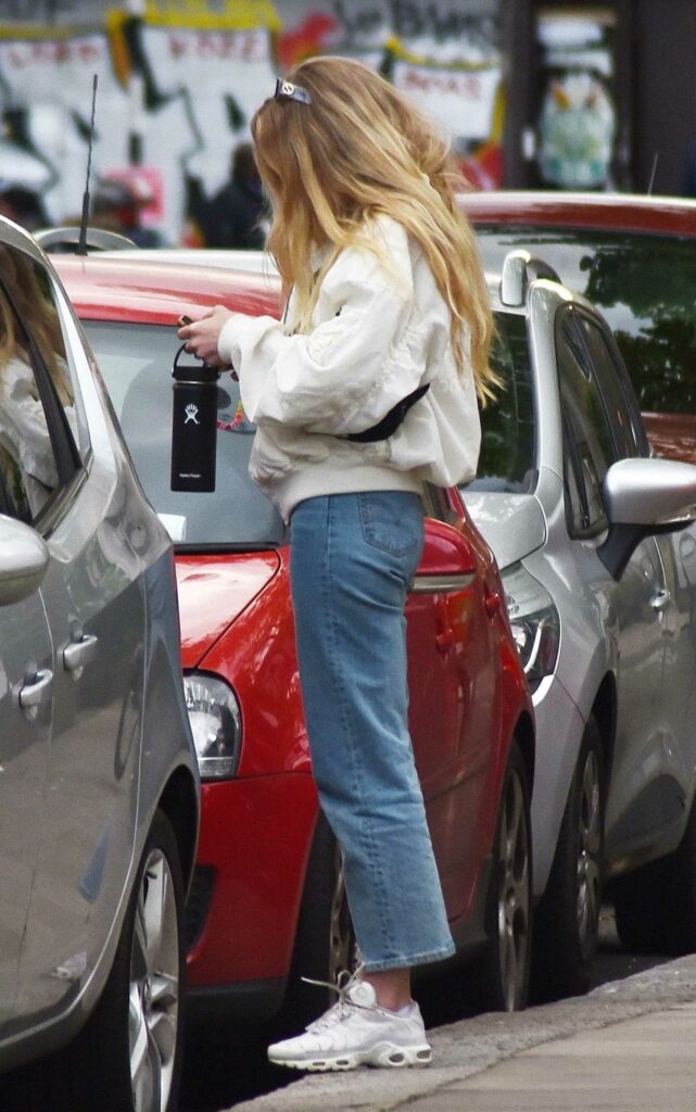 Clara Paget in a White Bomber Jacket