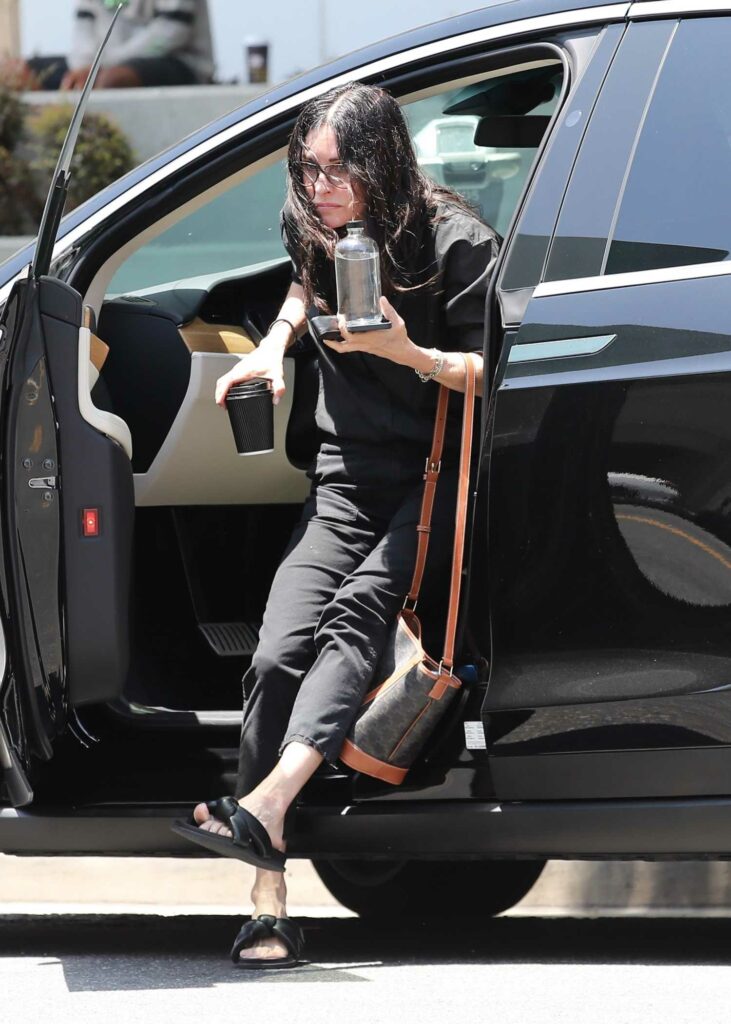 Courteney Cox in a Black Outfit