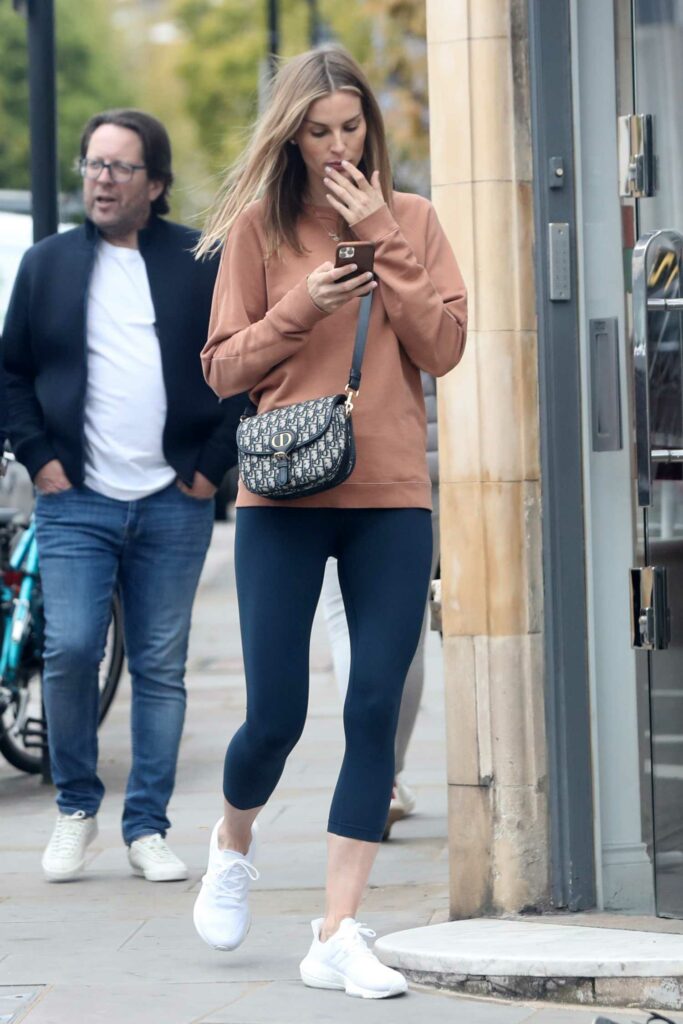 Frida Andersson-Lourie in a Tan Sweatshirt