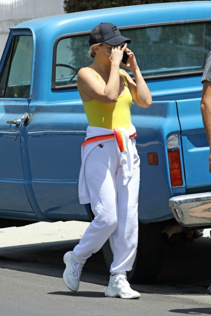 Kate Hudson in a Yellow Tank Top