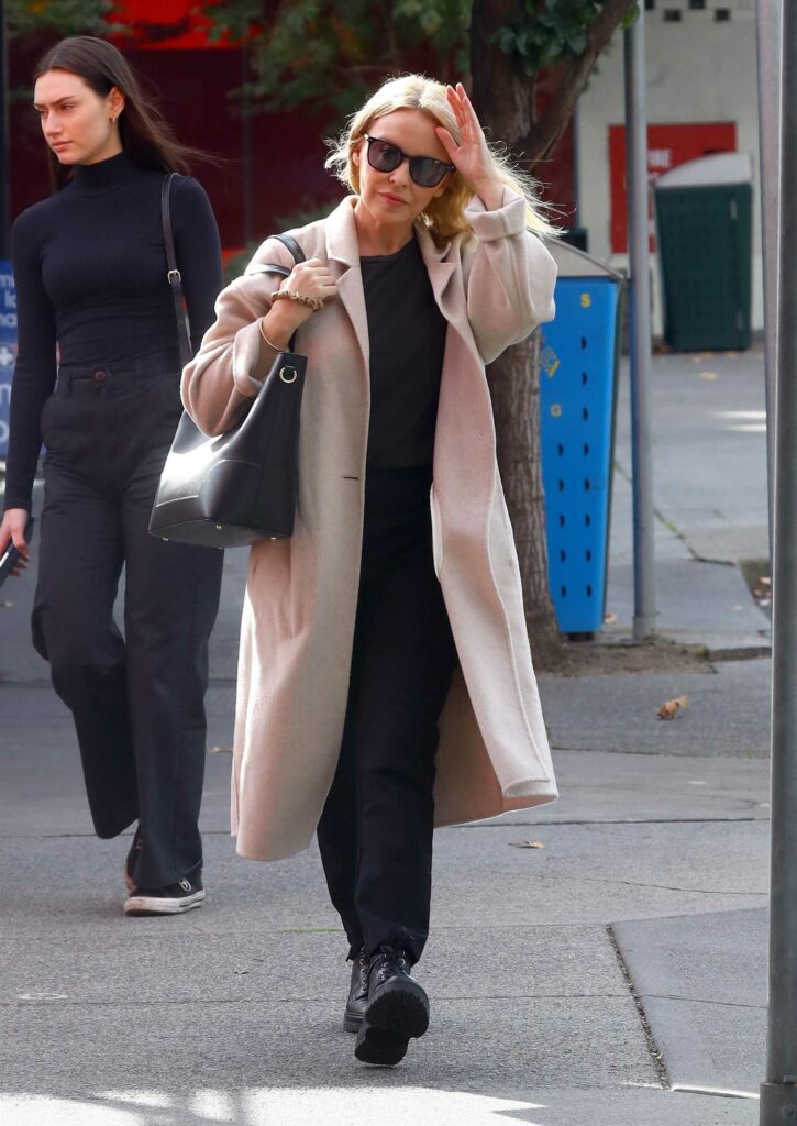 Kylie Minogue in a Beige Coat