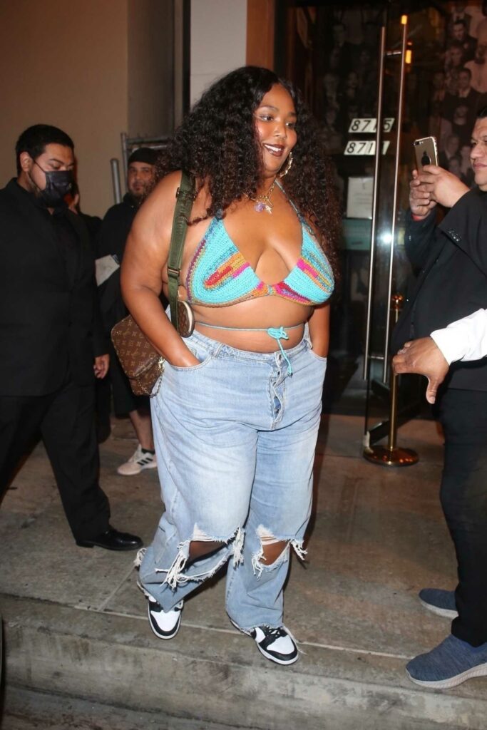Lizzo in a Blue Ripped Jeans