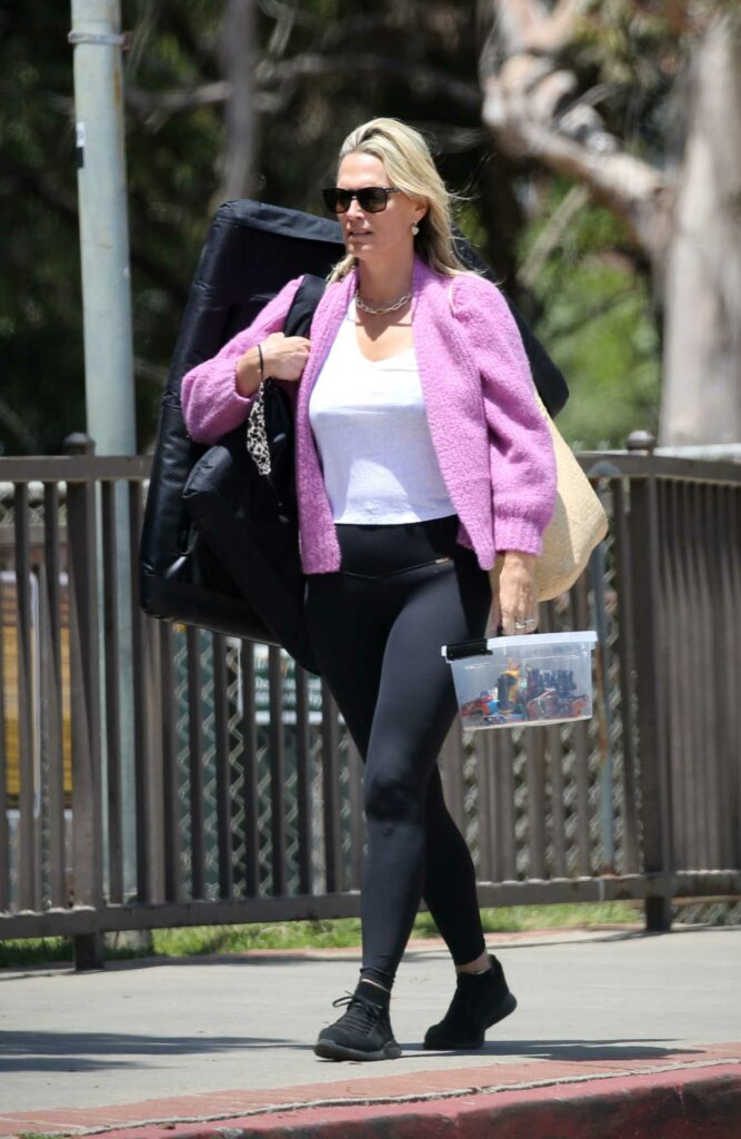 Molly Sims in a Lilac Cardigan