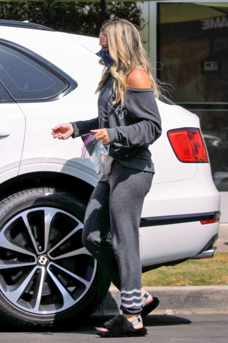 Teddi Mellencamp in a Grey Sweatsuit Stops for Gas in Los Angeles