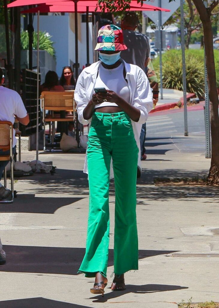Adut Akech in a Green Pants