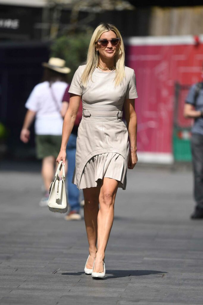 Ashley Roberts in a Beige Dress