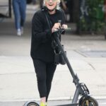 Deborra-Lee Furness in a Black Outfit Does a Scooter Ride in New York