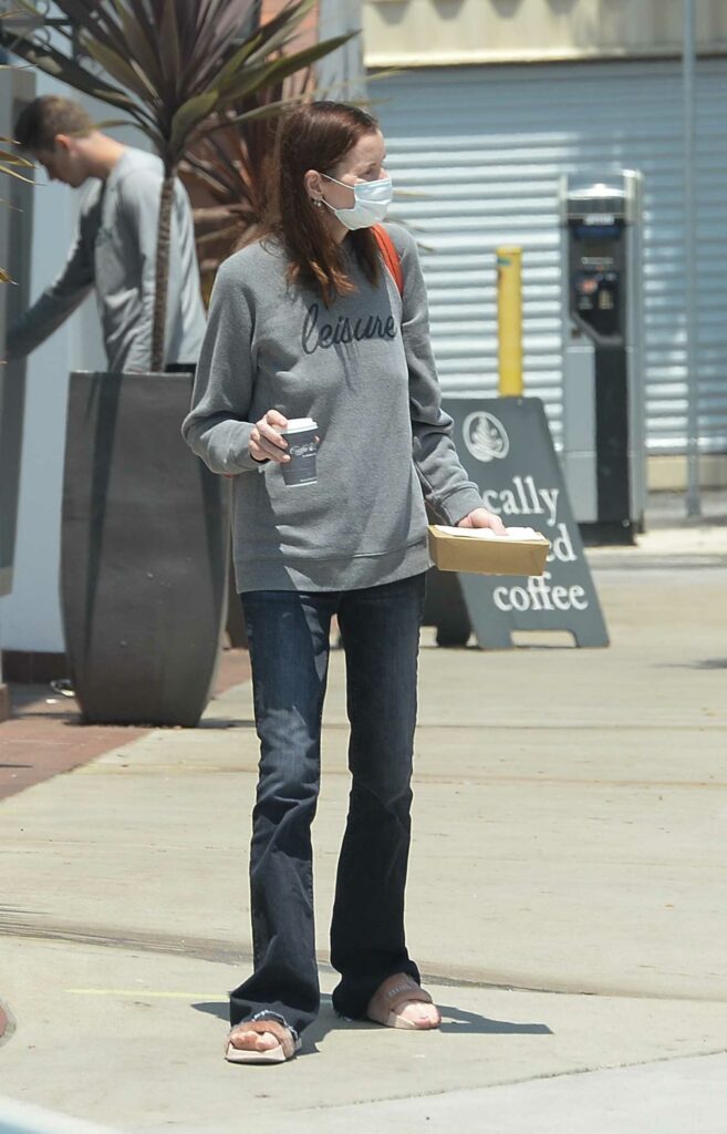 Geena Davis in a Grey Sweatshirt