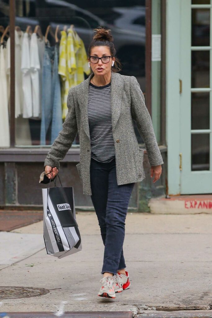 Gina Gershon in a Grey Blazer