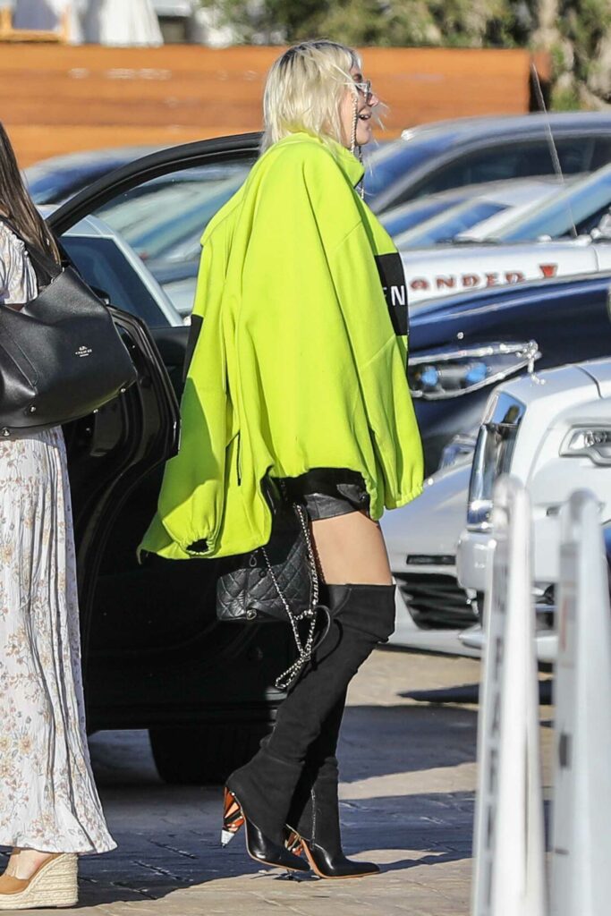 Kesha in a Neon Green Belenciaga Jacket